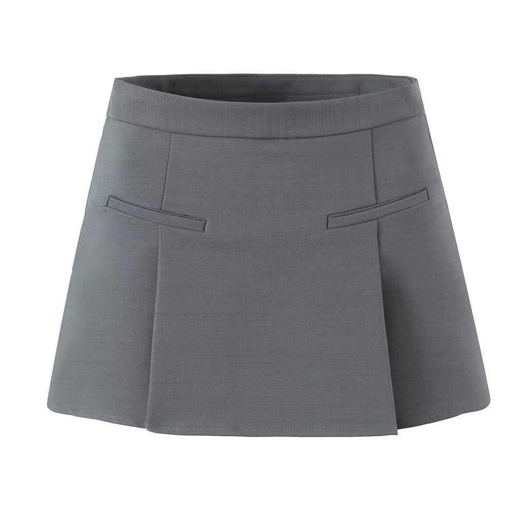 Charcoal gray A-line tailored skort with structured front knife pleats and clean waistband construction