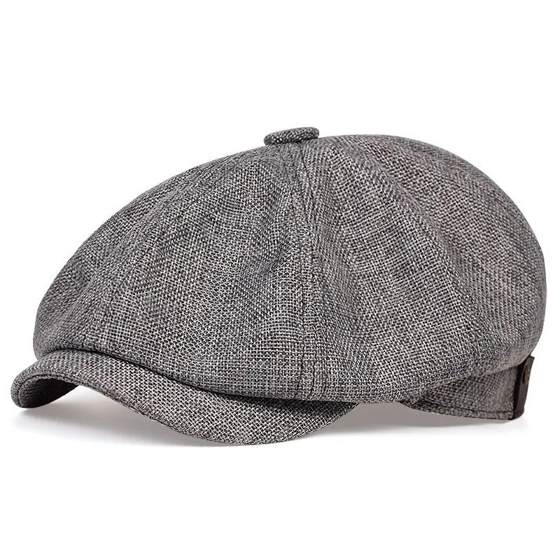 Front-facing view of the MONTQUANT retro beret cap in Dark Grey, emphasizing the clean dome shape and integrated visor architecture.