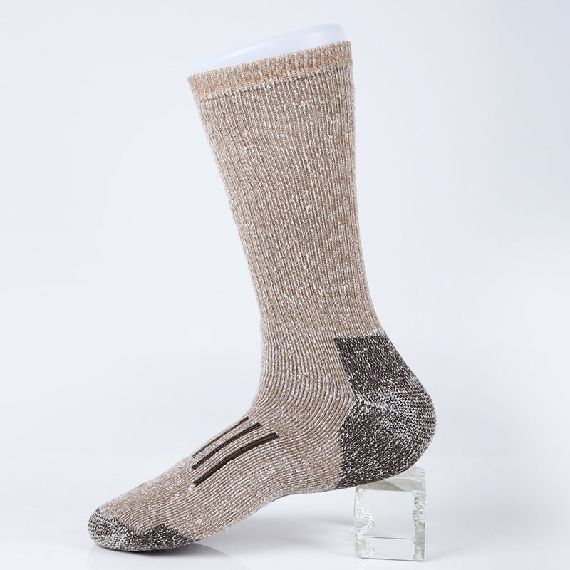 Side view of the MONTQUANT Merino Wool Sock in Coffee brown, highlighting the ergonomic knit zones around the heel and ankle matrix.