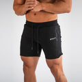 Front close-up view of the Montquant Performance Mesh Active Short in black, highlighting the athletic fit, premium adjustable drawstrings, split-hem detail, and clean branding.