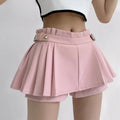 The light pink pleated skort shown on a model from the waist down.