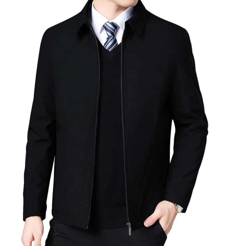 Front view of the Montquant Turn-Down Collar Zip Jacket in black, highlighting the crisp flat collar shape, streamlined zipper closure, and classic hip-length fit over a tie and sweater.