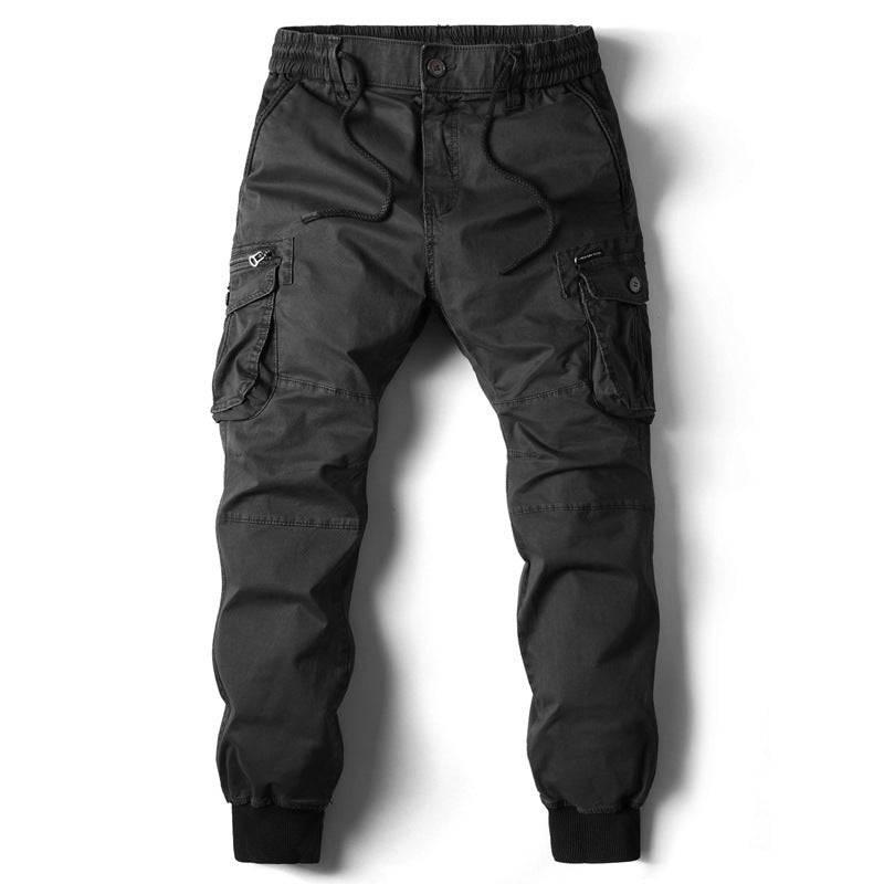 Front view of the MONTQUANT Elastic Cuff Cargo Trousers in rich monochrome Black, highlighting a sleek, stealth utilitarian silhouette.