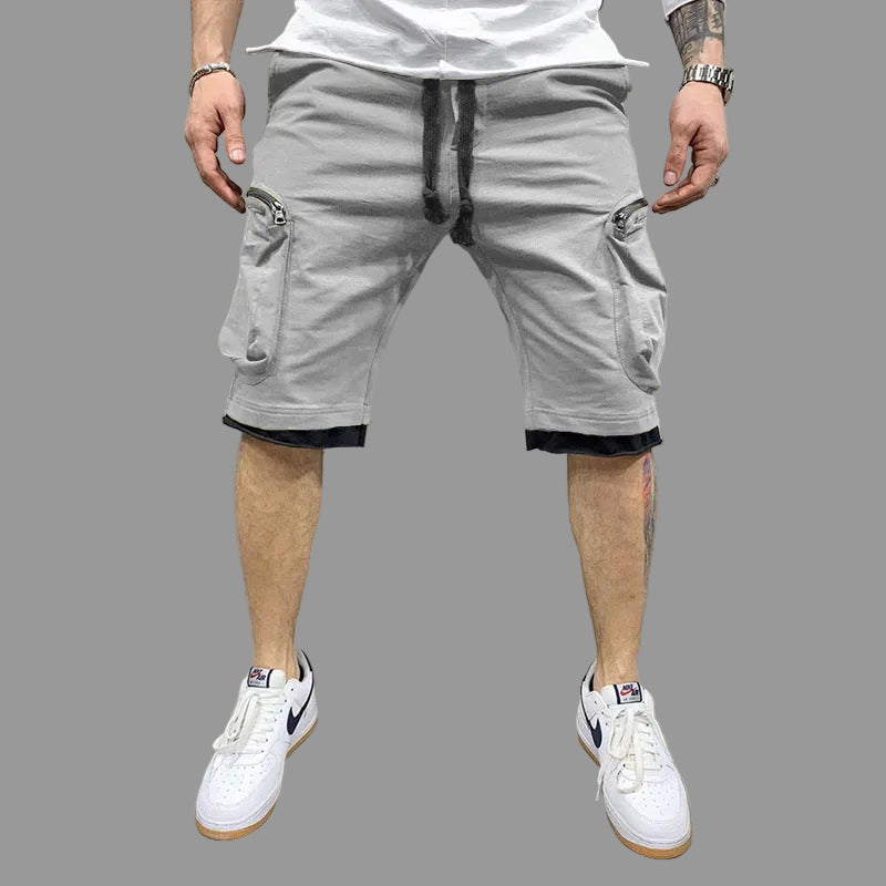 Studio layout of the MONTQUANT Layered Fitness Cargo Shorts in clean Heather Gray, displaying the high-density textile weave and industrial-grade pocket hardware.