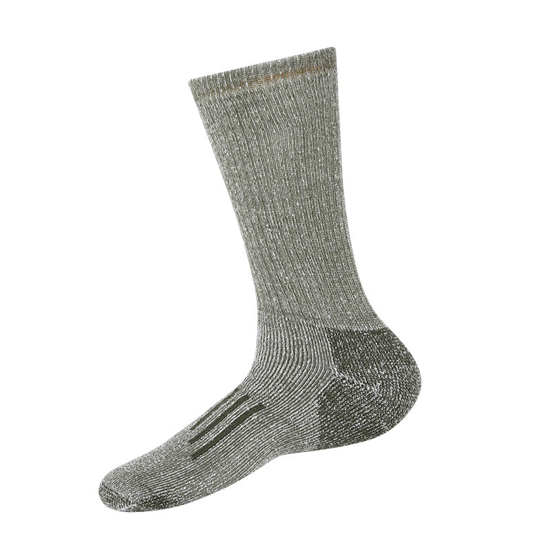 Profile studio view of the MONTQUANT Technical Merino Wool Hiking Sock in Military Green, showing the structured crew height, ribbed cuff, and contrasting dark grey footbed paneling.