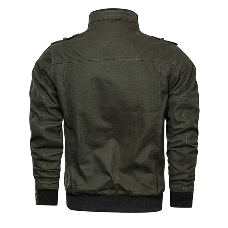 Rear view of MONTQUANT Military Cotton Jacket in C03 Green, showcasing clean panel stitching and the structured hang of the elasticated hem.