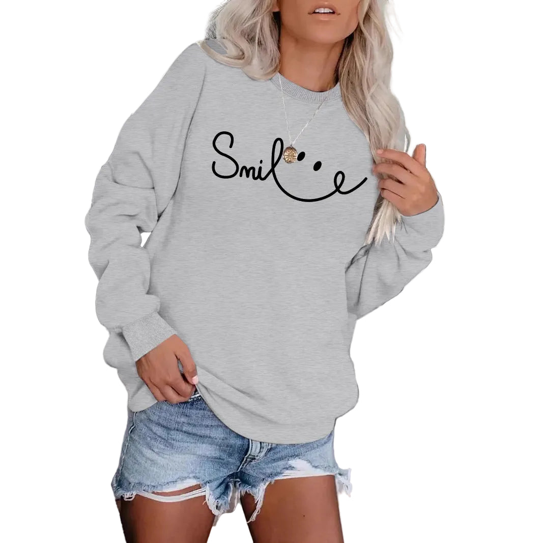 Model showcasing the Slate Grey casual crewneck sweatshirt with minimalist black script.