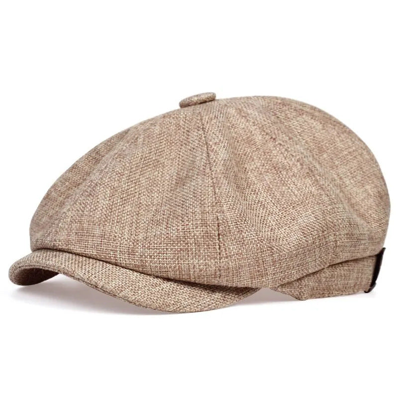 Studio shot of the MONTQUANT Textured Newsboy Cap, showcasing a sleek, minimalist street-style headwear silhouette.