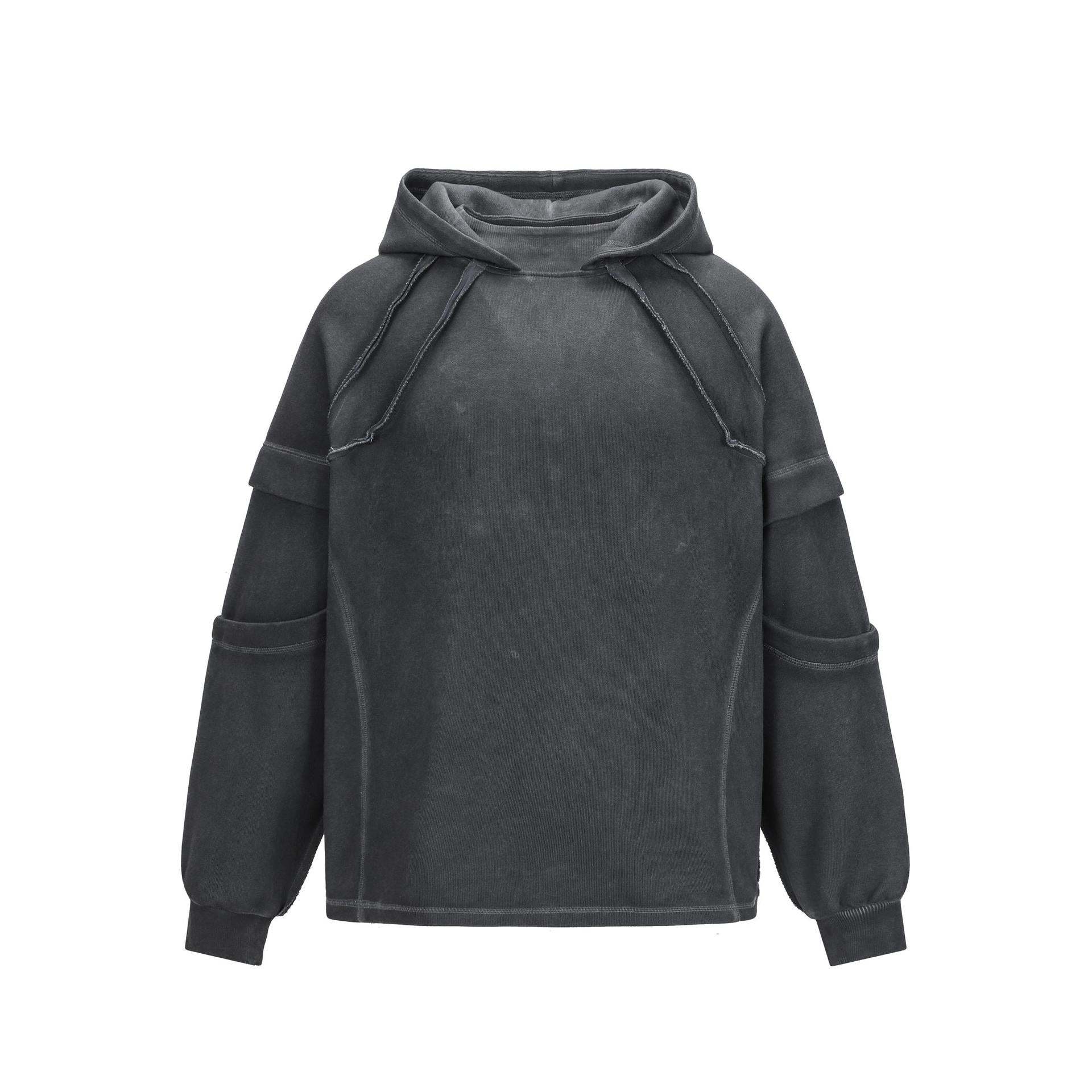 Front profile of the Montquant Distressed Patchwork Hoodie in a washed charcoal grey finish, highlighting the clean structural paneling across the shoulders and premium fabric density.