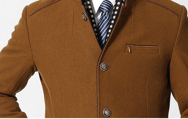 Close-up technical detail of the MONTQUANT double-collar construction, showcasing the clean stitching, horizontal zippered chest pocket, and sharp lapel geometry.
