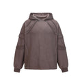 Front view of the Montquant Distressed Patchwork Hoodie in a washed espresso brown hue, showcasing its heavy-weight structural hood, raw-edge patchwork paneling, and drop-shoulder design.