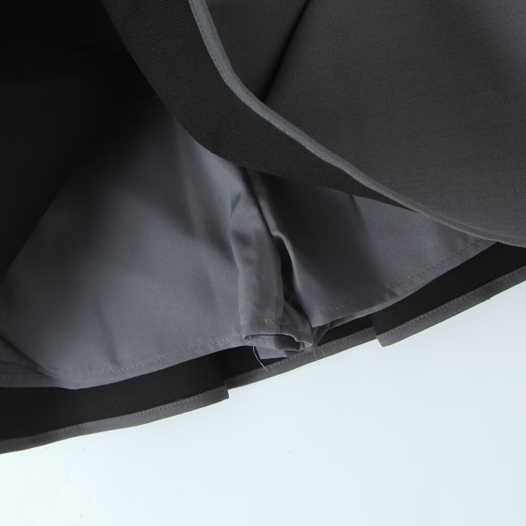 Underneath view of the suit skirt showing the built-in matching safety shorts lining for comfort