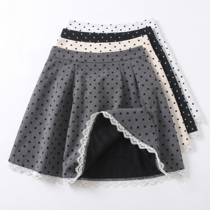 Back and side view showing the silhouette of the layered polka dot mini skirt with lace hem